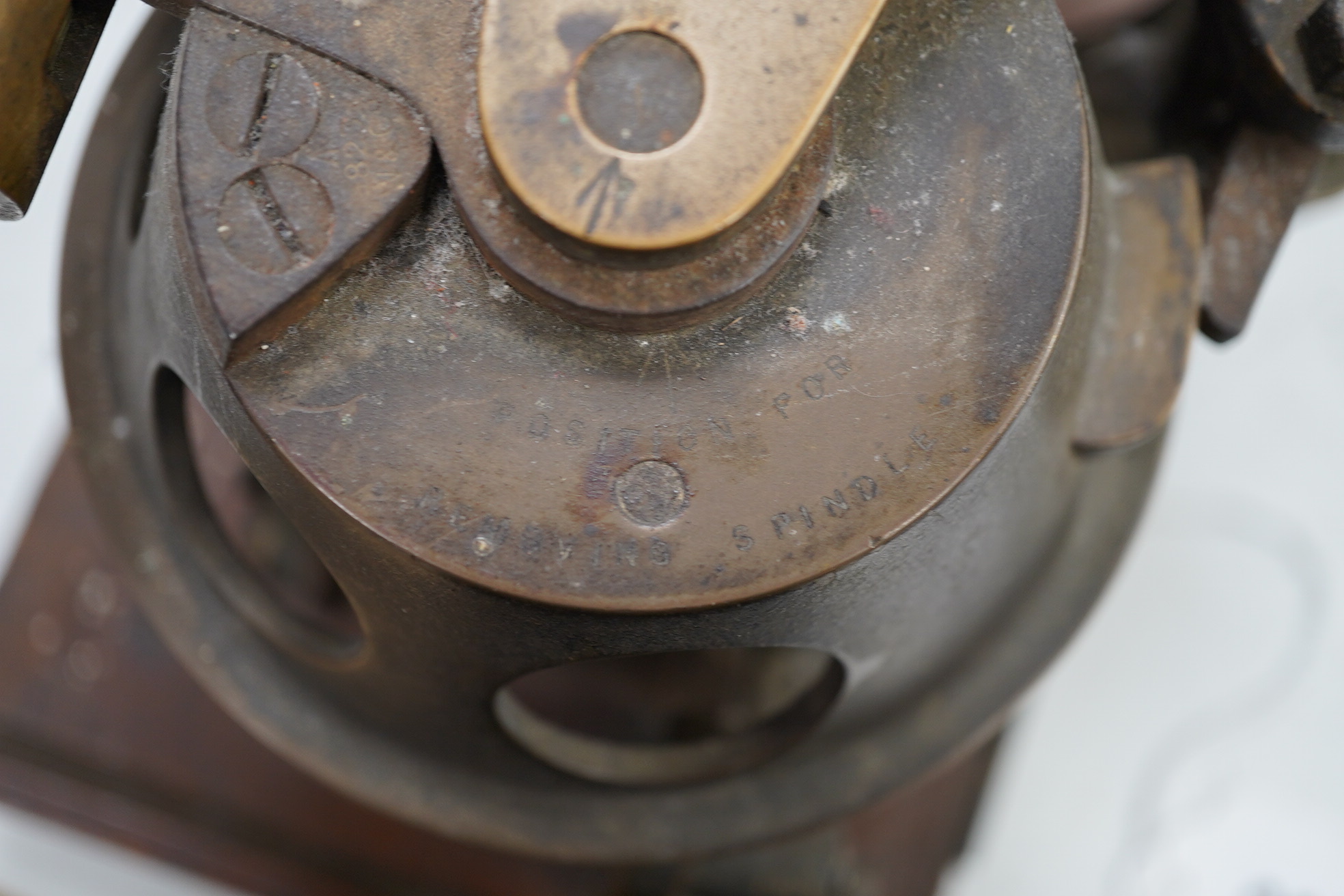 A First World War torpedo gyroscope, stamped 2878 W&Co. top part of the wooden case missing, 21cm high x 24cm wide. Condition - some general wear and damage, unknown if in working order.